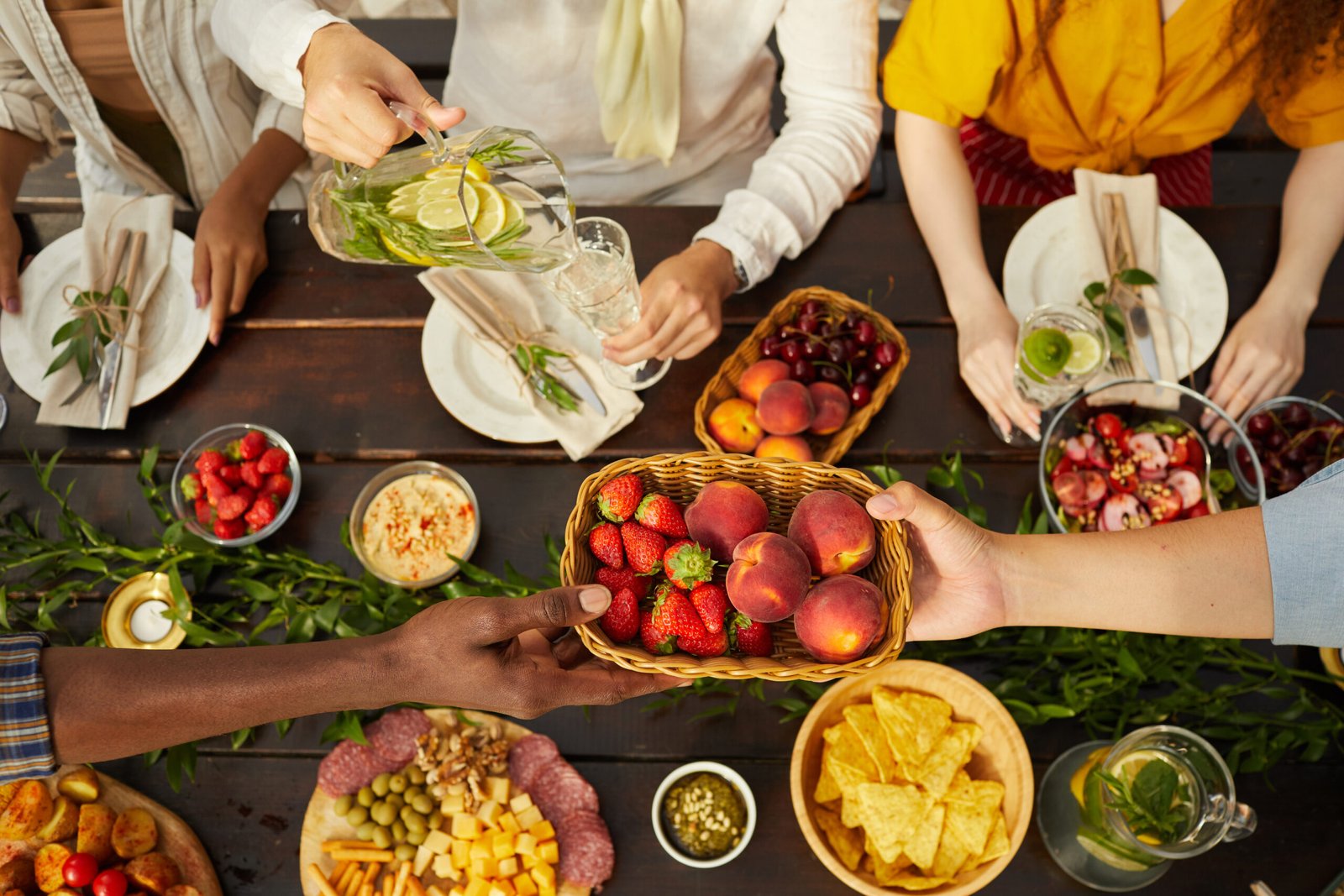 Friends at Summer Dinner Table Above View